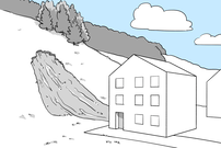 Un bâtiment échappe de peu à un glissement de terrain superficiel qui s'est détaché aux alentours.